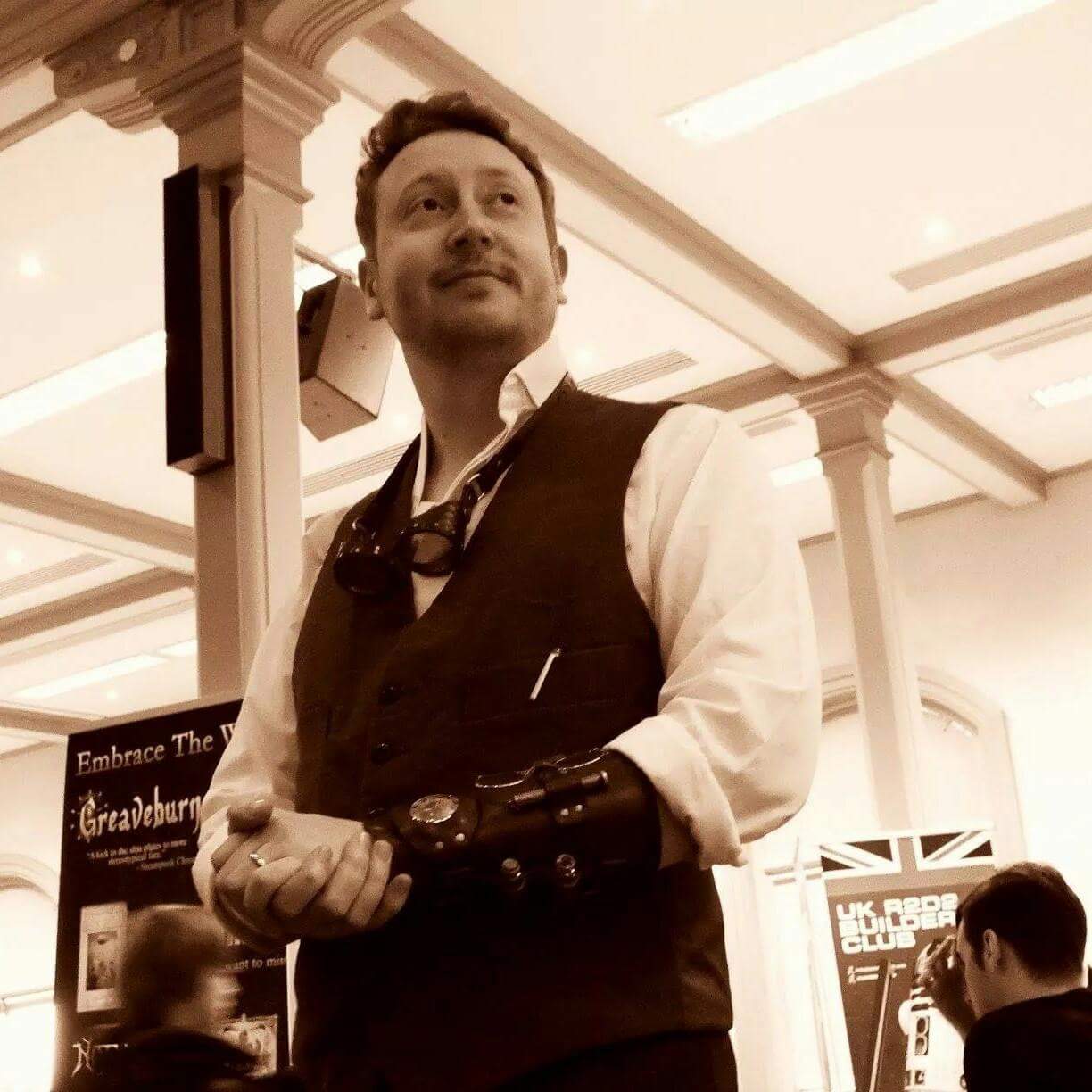 Author Craig Hallam wearing steampunk outfit and looking away from the camera